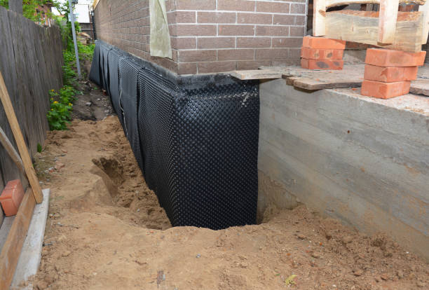 Happy homeowners after waterproofing job in Taylorsville
